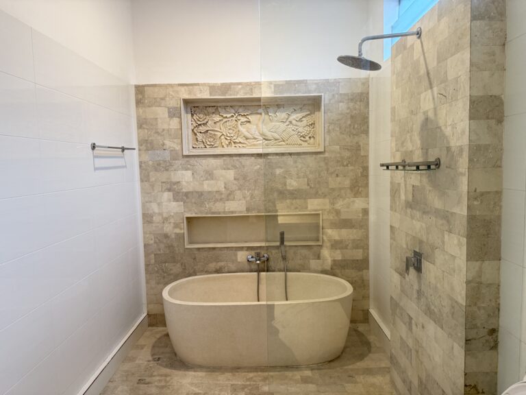 Bathroom with freestanding bathtub and shower at Panoramic Villa