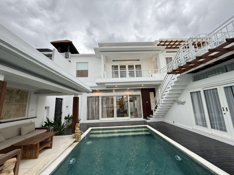 Pool and outdoor lounge between the villa buildings at Panoramic Villa