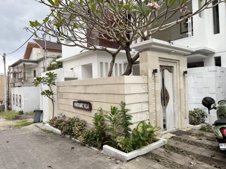 Villa entrance with frangipani tree at Panoramic Villa
