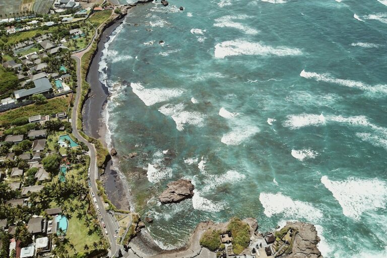 Aerial view of Canggu's black-sand coastline and surf breaks
